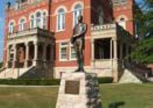 Historic Fayetteville Courthouse with statue of LaFayette